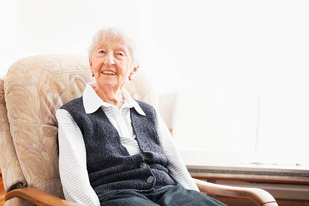 istock senior woman at home portrait 174864596