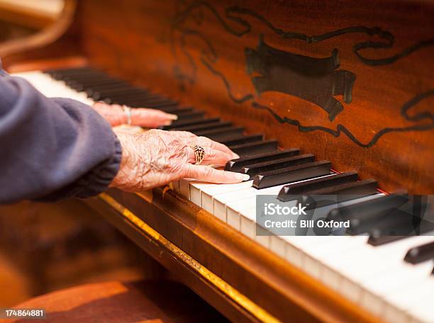 Playing Piano Stock Photo - Download Image Now - Piano, Playing, Senior Adult