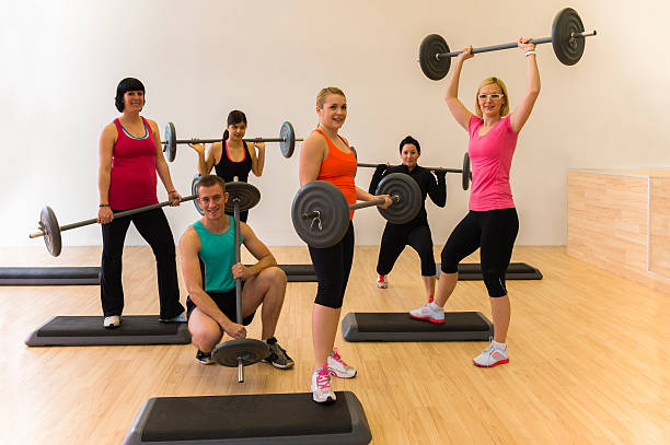 istock Group of young people posing in the gym 174865150