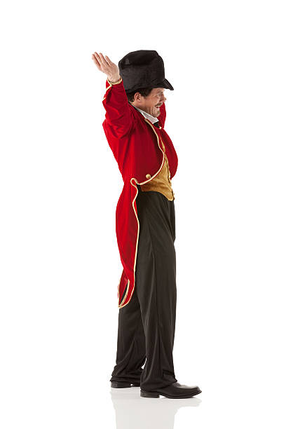 istock Profile of an animal tamer with hands raised 174865348