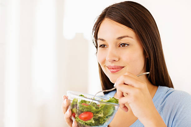 istock Woman Having Healthy Vegetable Salad 174865677