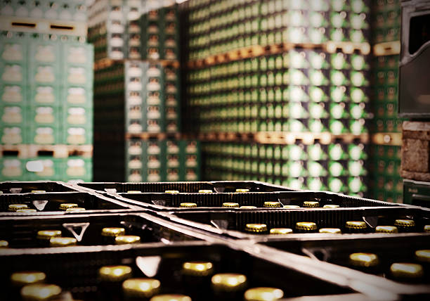 Many beer crates A beer warehouse with many brands of beer. Selective focus. beer crate stock pictures, royalty-free photos & images