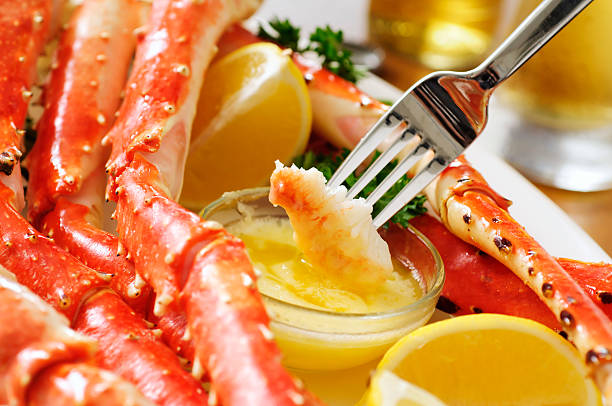 King Crab Plate King crab legs with butter lemon and beers.  Please see my portfolio for other food related images. crab photos stock pictures, royalty-free photos & images