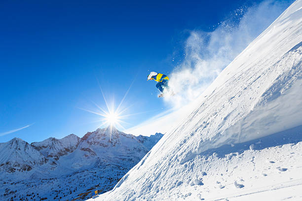 istock Freestyle snowboarder in a jump 174866326