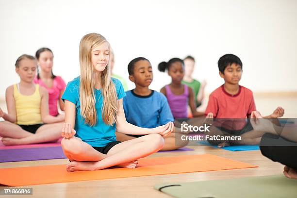 Kids Yoga Stock Photo - Download Image Now - 10-11 Years, Meditating, Child
