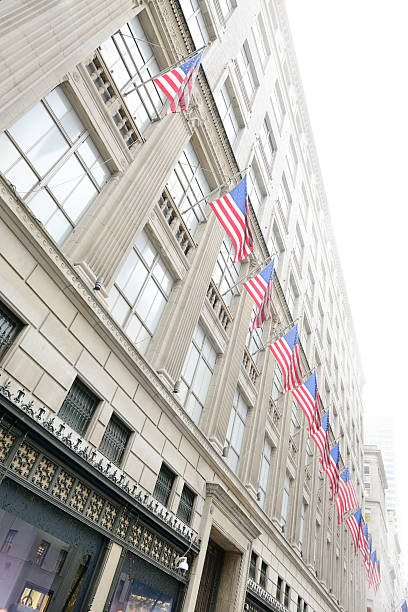 istock American flags and tall buildings in NYC 174867052