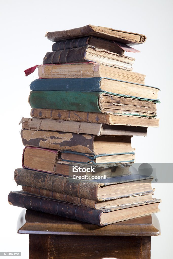 Antique Books Stack of old books on white background 19th Century Stock Photo