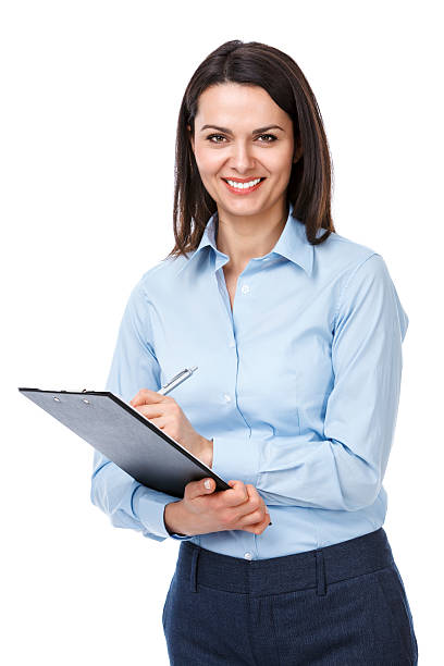 istock Pretty young businesswoman with clipboard 174867462