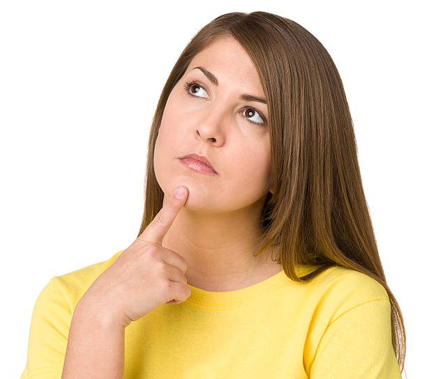 istock Pensive Young Woman Looking Up 174867554