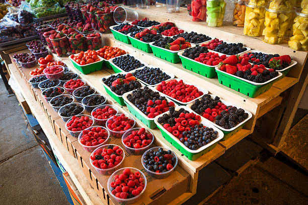 fresh fruits and vegetables on display at the Jean Talon Market in Montreal Quebec Canada