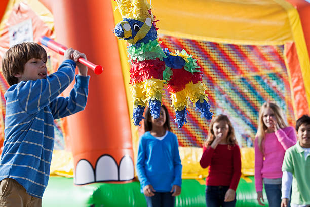 istock Pinata at children's birthday party 174868674
