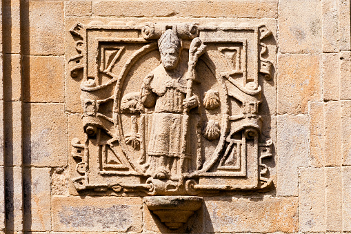 Sculpture of bishop, ancient catholic church. Santiago de Compostela, A Coruña province, Galicia, Spain.