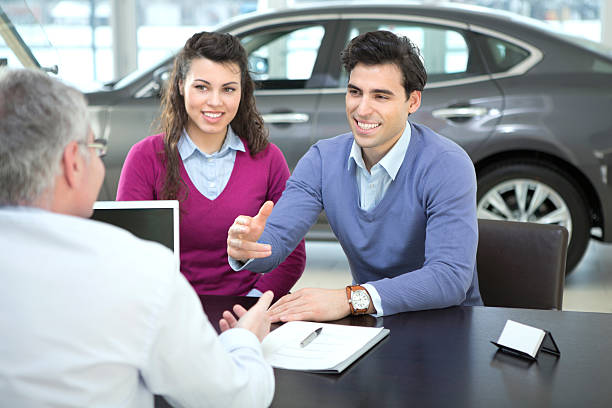 istock Couple buying car. 174869161