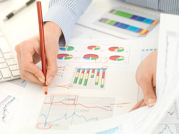 istock Businessman woman to analyze the material. 174869312