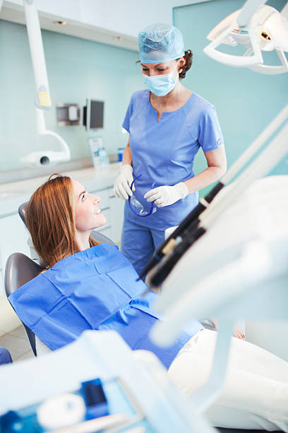istock Dental heath assistant and patient. 174869638