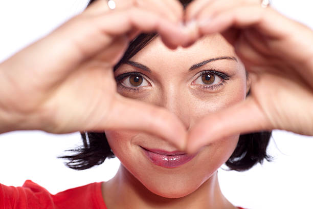 istock Woman forming hands in heart shape 174869802
