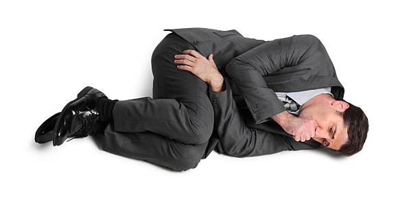 istock Businessman In Fetal Position 174869974