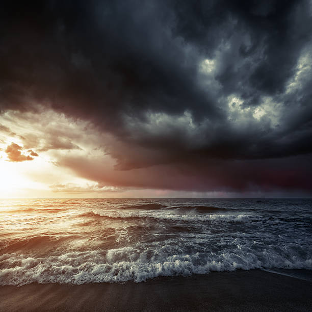 istock Stormy sea at sunset 174870072