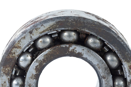 Worn bearing on a white background