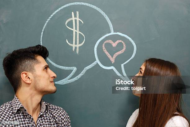 Man Thinks About Money And Woman About Love Stock Photo - Download Image Now - Currency, Talking, Love - Emotion