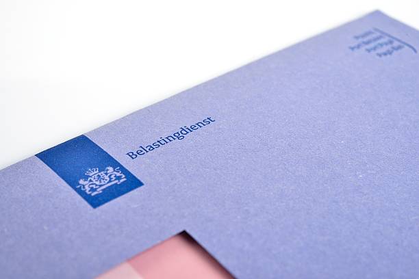 Dutch tax envelope Blue Dutch tax envelope detail. netherlands currency stock pictures, royalty-free photos & images