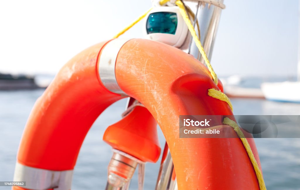 Rescue ring Rescue sea  ring orange on the boat Life Belt Stock Photo