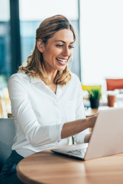 istock Business woman working in cafe 1748708503
