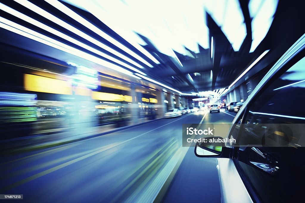 Driving in night The car in night motion blur. Automobile Industry Stock Photo