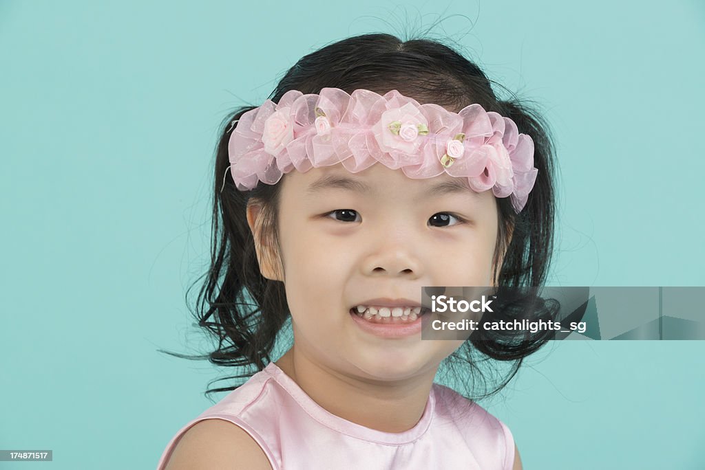 Little Chinese Girl A cheerful Chinese girl in close up. 2-3 Years Stock Photo