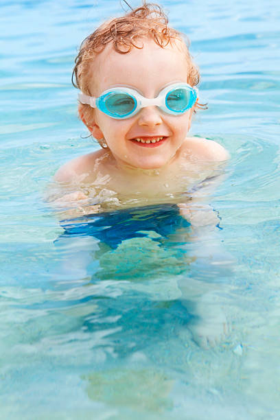 istock Little boy swimming in the sea 174872052