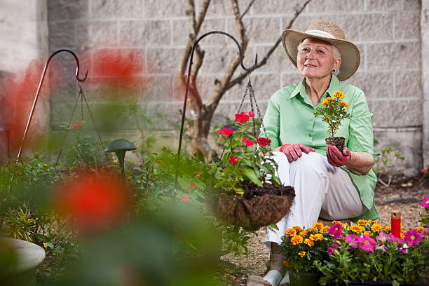 istock Elderly woman gardening 174872378