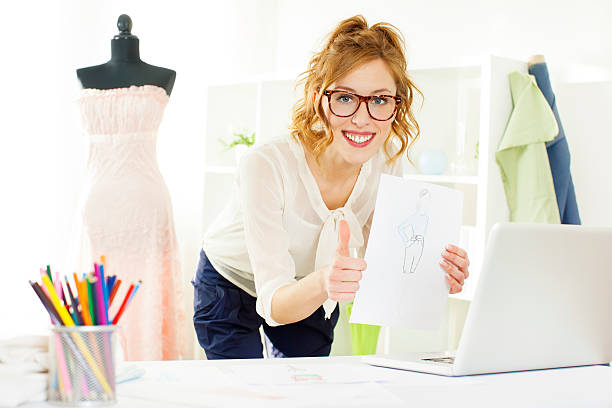 istock Young Woman Fashion Designer Communicating over Internet. 174872420