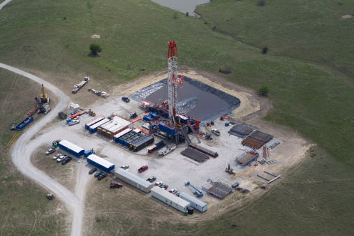 Aerial view of a hydraulic fracturing operation in search of natural gas and oil. Horizontal composition.