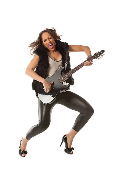 istock Excited woman playing a guitar 174872655