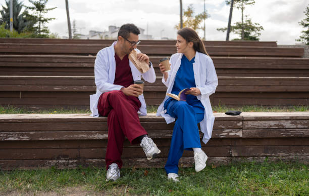 istock Two Medical Professionals On A Lunch Break 1748730289