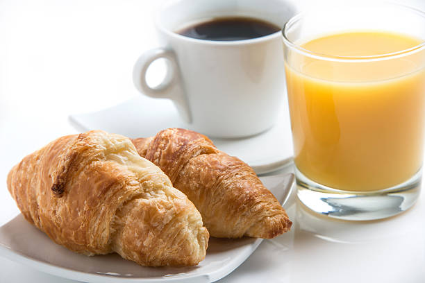 istock A continental breakfast including croissants and coffee. 174873306