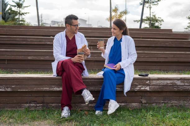 istock Two Medical Professionals On A Lunch Break 1748733572