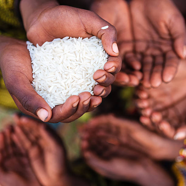 istock Hands of poor - asking for food, Africa 174873436