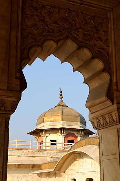 istock Scalloped arch and gilded octogonal dome Agra Fort 174873747