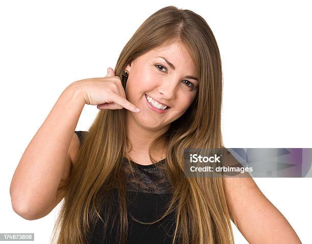 Young Woman Gestures Call Me Telephone Hand Sign Stock Photo - Download Image Now - 18-19 Years, 20-24 Years, 20-29 Years