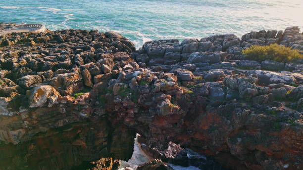 istock Stunning drone rocky seashore beautiful sunny day. Dangerous coastal cliffs. 1748740612