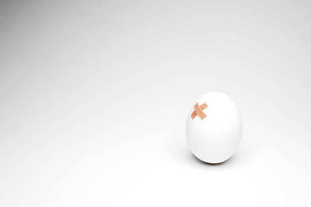 Bruised Egg with Copyspace stock photo