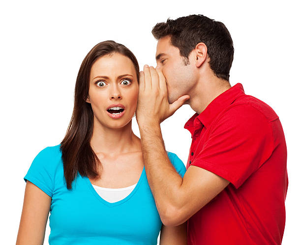 istock Man Telling a Secret To Woman - Isolated 174874476