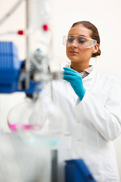 istock Female scientist working in a laboratory 174874495