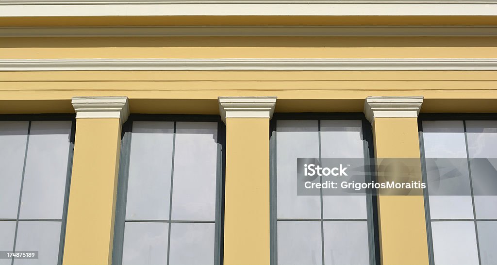 Neo-Classical Background Neo-Classical architecture facade detail. Architectural Column Stock Photo