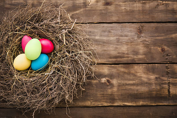 istock Colorful Easter Eggs Decorated on Wooden Background 174875194