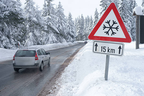 istock Road in winter with traffic sign 174875761
