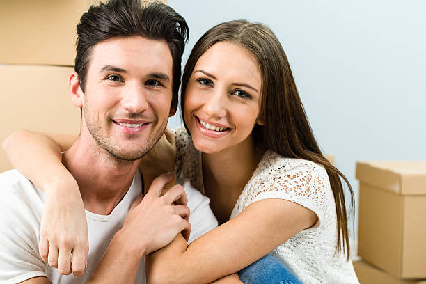 istock Happy couple moving house 174875880