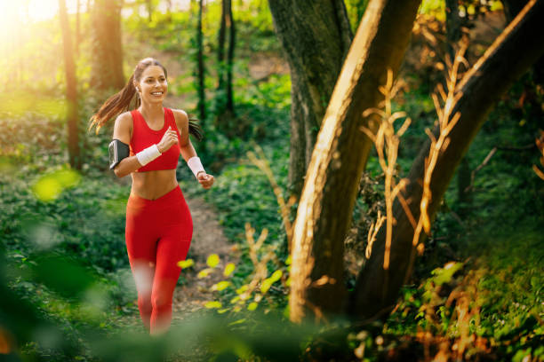 istock Young beautiful woman jogging workout training 1748765473
