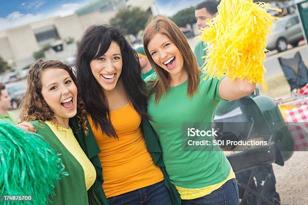 Excited Group Of College Sports Fans Cheering At Tailgate Party Stock Photo - Download Image Now
